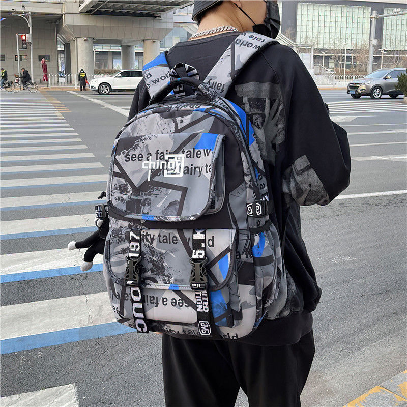 【券后价:69元】 书包男高中生初中生大容量潮流迷彩双肩包 - 唯美品牌折扣店